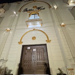 Golden Fort facade and carved wooden entrance