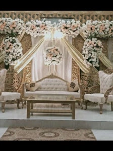 Ivory drape stage with white flowers